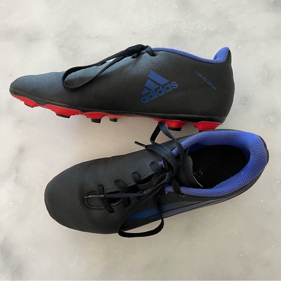 Adidas Unisex -Child X Speedflow. 4 Flexible Ground Soccer Cleat. Black, blue. 4 - Picture 3 of 8